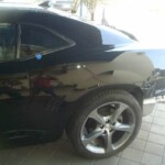 Photographs of a 2014 Chevrolet Camaro that was in an accident and repaired by Elite Paint & Body Shop in West Palm Beach Florida